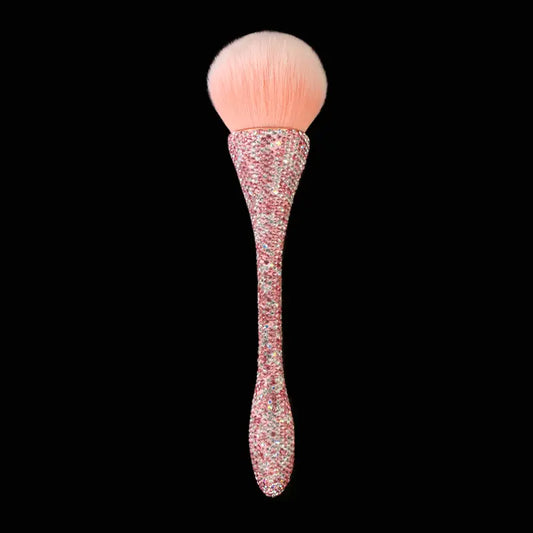 One single-piece diamond-handle brush with a slim waist designed for blusher, smudging, and loose powder application. Suitable as a beauty tool.