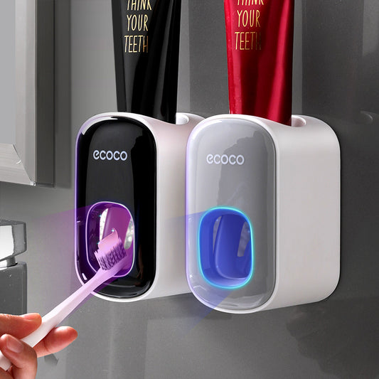 This wall-mounted toothpaste dispenser offers an automated way to dispense your favorite toothpaste